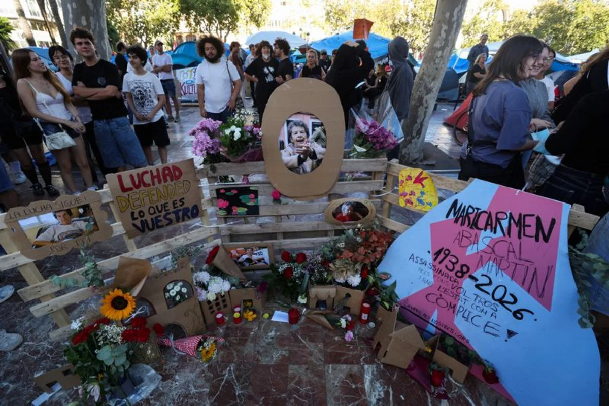 Thousands of Spaniards march to mark death of octogenarian at heart of housing protests